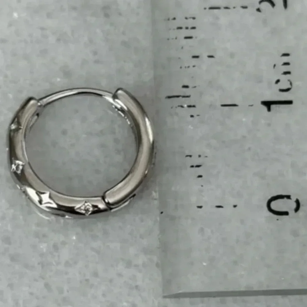 New Stock! Sterling Silver Star Crystal Pave Hoop Earrings

Brand New - Picture 4 of 5